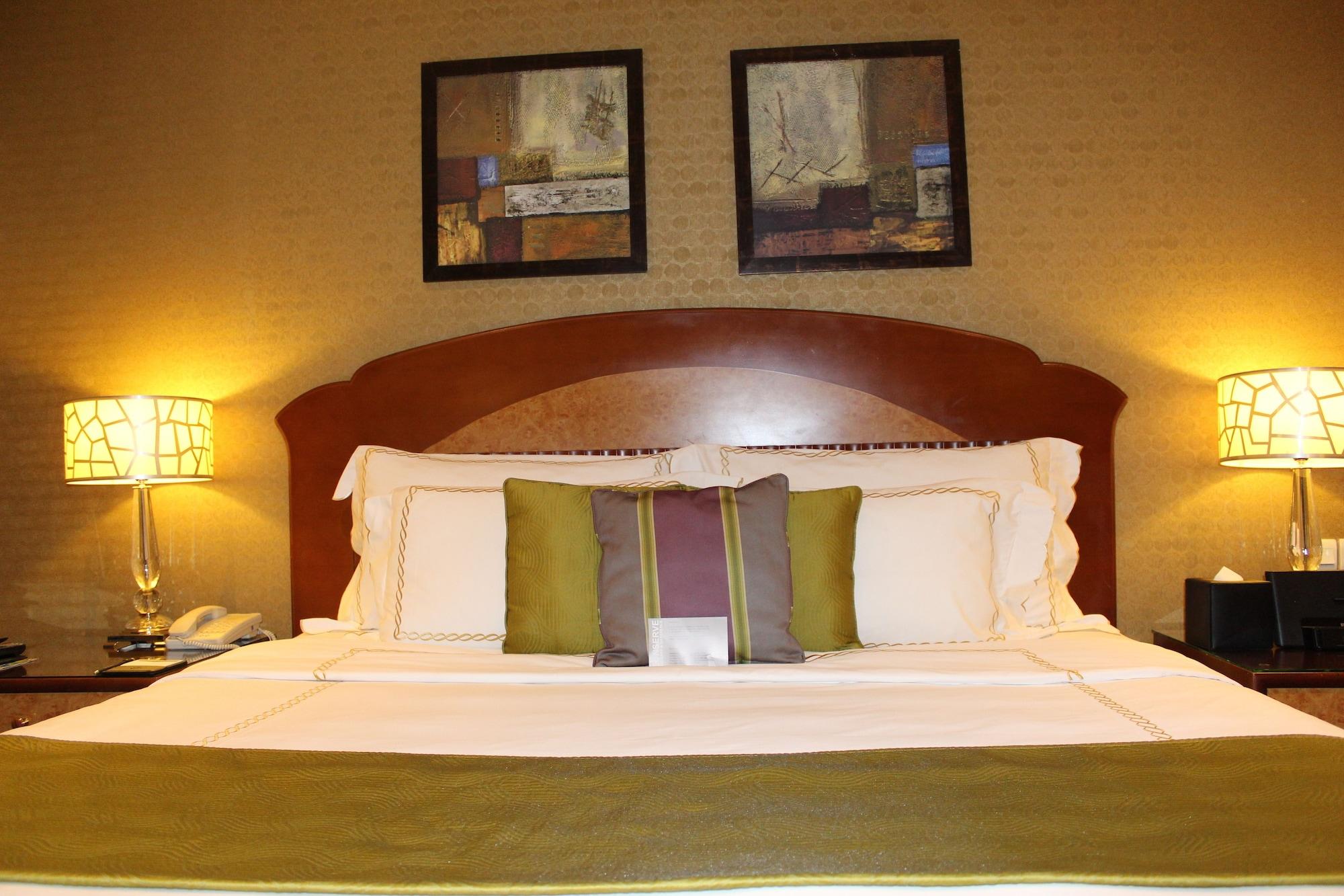 فندق ويندهام جراند ريجنسي الدوحة المظهر الخارجي الصورة A bedroom at the hotel